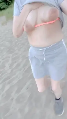 It was really hot, too hot for a top even, so I took it off at the public beach and went for a run