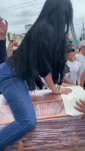 Woman Twerking on Boyfriend`s Casket