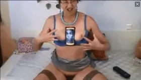 57-yr Old Estonian Woman Flexes Her Strong Biceps