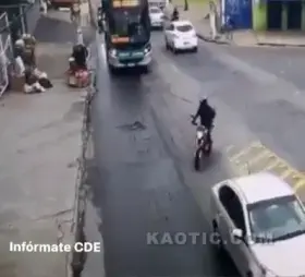 Pillion rider fell under the bus