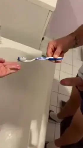 Brushing Her Teeth With Cum