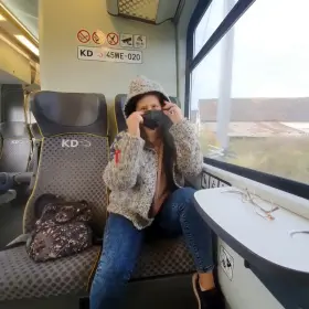 Such fast action on the train. The camera operators were probably surprised by what appeared from under this modest sweater