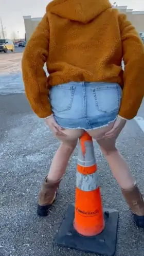 Our ass to mouth queen gives the parking cone a thank you kiss.