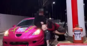 fucking on top of an expensive car