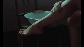 Fernanda Torres taking a sexy bath in brazilian film Inocência (1983)