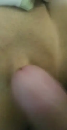 Rubbing her tight pussy with my cock.