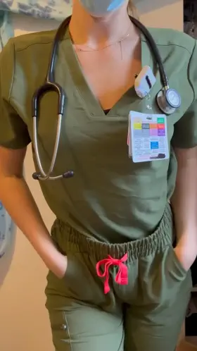Teasing you a bit in my green scrubs until I reveal my huge ass