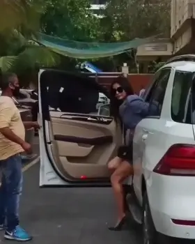 Mouni Roy flaunting her sexy body...The way she adjust her dress ,i doubt something fissy might be going there in car 🤭😝