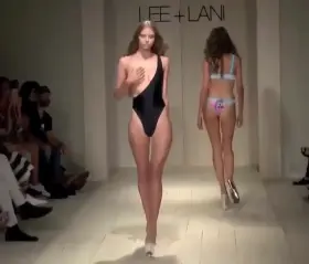 Modeling Swimsuits On The Catwalk And Dat Surprise Bewb