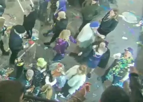 sexy woman flashing boobs for beads on bourbon street