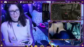 Nerdy looking gamergirl touching herself while playing video games