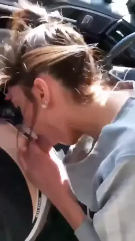 Having blow job in the car