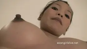 Asian webcam girl showing off her nipples