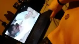 QOS wife using a BBC dildo while watching porn.
