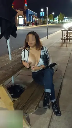 Playing With My Big Titties While Waiting To Be Seated For Dinner