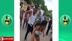 Climbing onto a pickup truck at the street dance