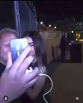 Madison beer taking pics with her middle-aged fans. Do you think these fathers will be going straight to the bathroom when they get home?