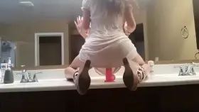 White Dress On A Suction Dildo