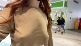 Beauty flashes titties in a mall