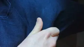 Stroking through my jeans