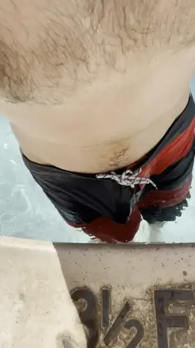 Wet swimsuit bulge