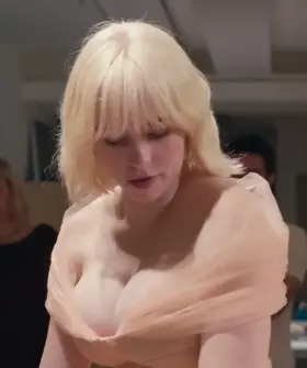 Billie Eilish looking very busty
