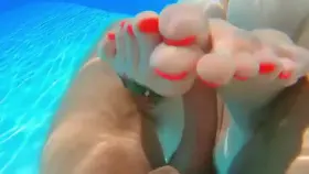 footjob underwater