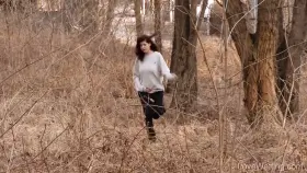 Rachel peeing in the woods