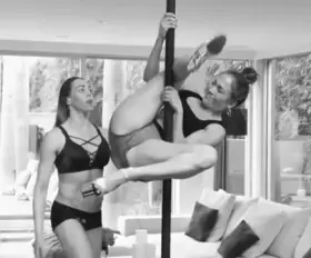 Practicing pole dancing