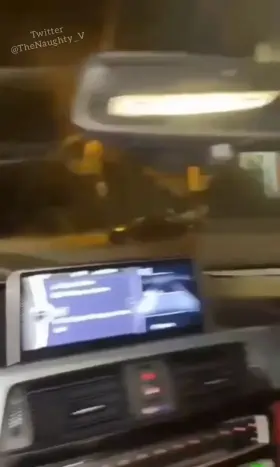 Wife riding friend in backseat