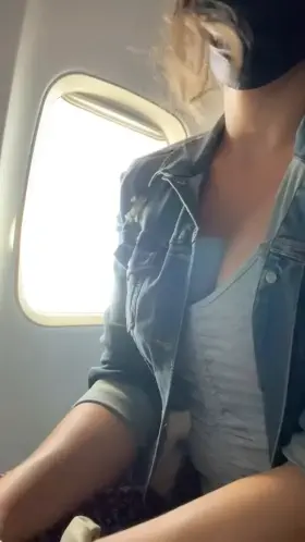 This plane is my last chance to be naughty for a while! Flying home for the Holiday break, so I had to pull my tiddies out.
