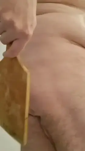 Self spanking with a wet paddle. Redgifs link has sound