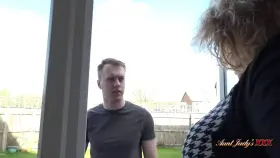 Son spying on the neighbor lady doing some topless sun tanning by YouPerv