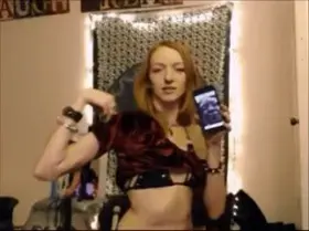 Redhead Yoga Lady Flexes Her Strong Arms