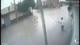 3 men electrocuted in succession after touching metal pole in a flooded street