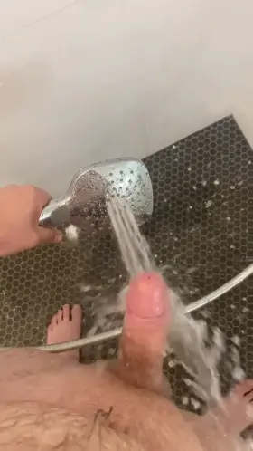 Edging myself and cumming hands free with a shower head. Sound up for moans 🥵