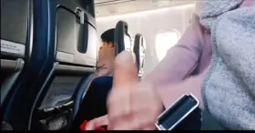 Handjob on the plane [00:18]