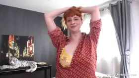 Busty redhead nympho Rhia loves a hard fuck