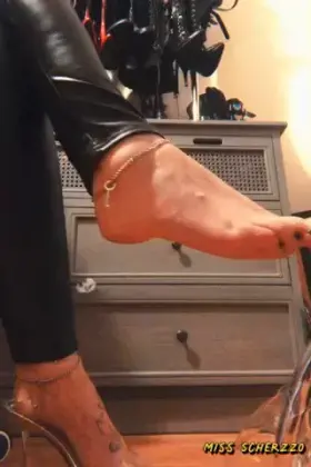 Locked in chastity and taunted with your key during foot worship. Sounds like heaven doesn’t it?