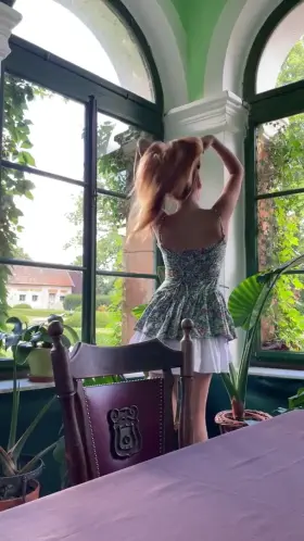 Just a redhead in some green dress ;)