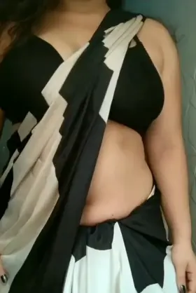 Thick Indian MILF in saree with natural big tits and creamy fair skin strip tease and moans