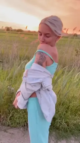 little strip teen girl on the background of a beautiful sunset!