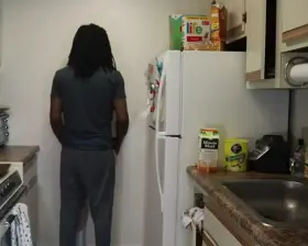 Amateur sex in a kitchen