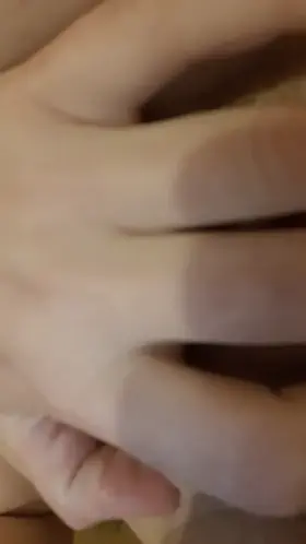 Splashing her face with her pee