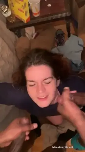 two black dicks cum on her cute face