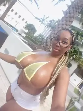 Huge tits in a bikini (Anyone know her name?)