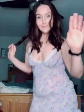 Tiny dress does it best to cover it