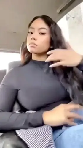 Asian flashing big tits in her car