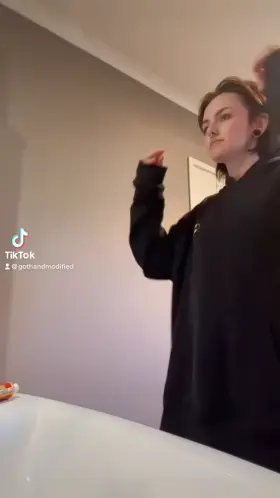 Guess what’s under my hoodie 🖤