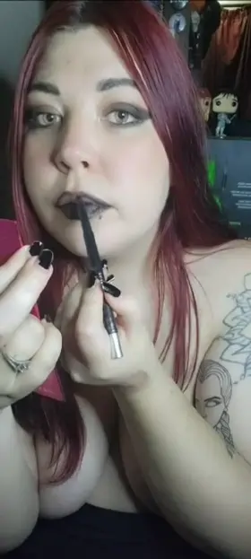 Watch me do my black lips